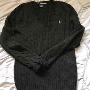 Black v- neck cable sweater.